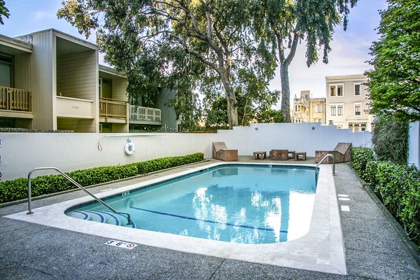 Modern pool with sundeck at Crystal Tower Apartments offering luxury amenities near downtown