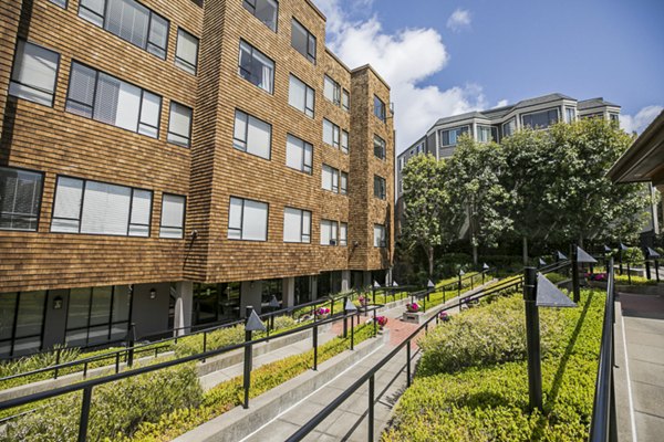 Marina Cove Apartments: Elegant waterfront high-rise building exterior