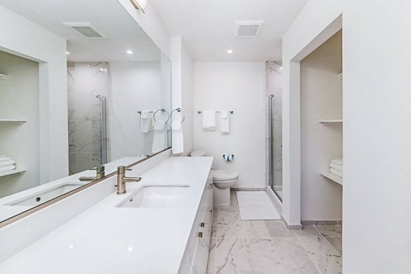 Modern bathroom with sleek fixtures and soft lighting at Marina Cove Apartments, luxury living by Greystar
