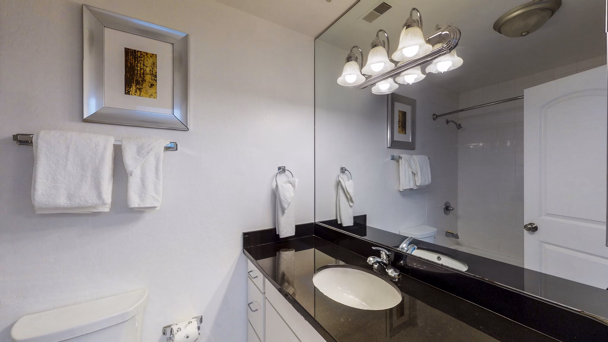 Bathroom featuring elegant marble countertops and modern fixtures at Marina Cove Apartments, Greystar luxury apartments in scenic waterfront location