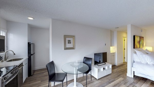 Dining room featuring elegant wood furniture at Marina Cove Apartments
