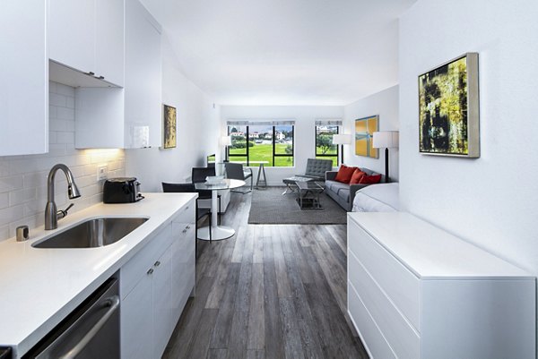 Modern kitchen with stainless steel appliances at Marina Cove Apartments, a Greystar luxury property in a scenic waterfront location