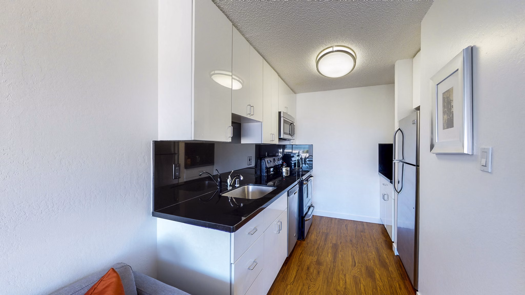 Contemporary kitchen with modern appliances at Marina Cove Apartments