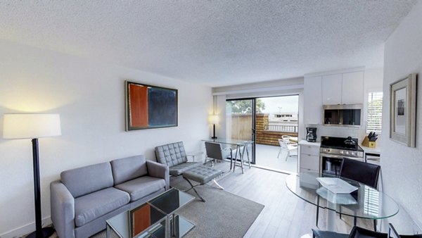 Cozy living room with modern decor at Marina Cove Apartments, perfect for luxury living near the waterfront