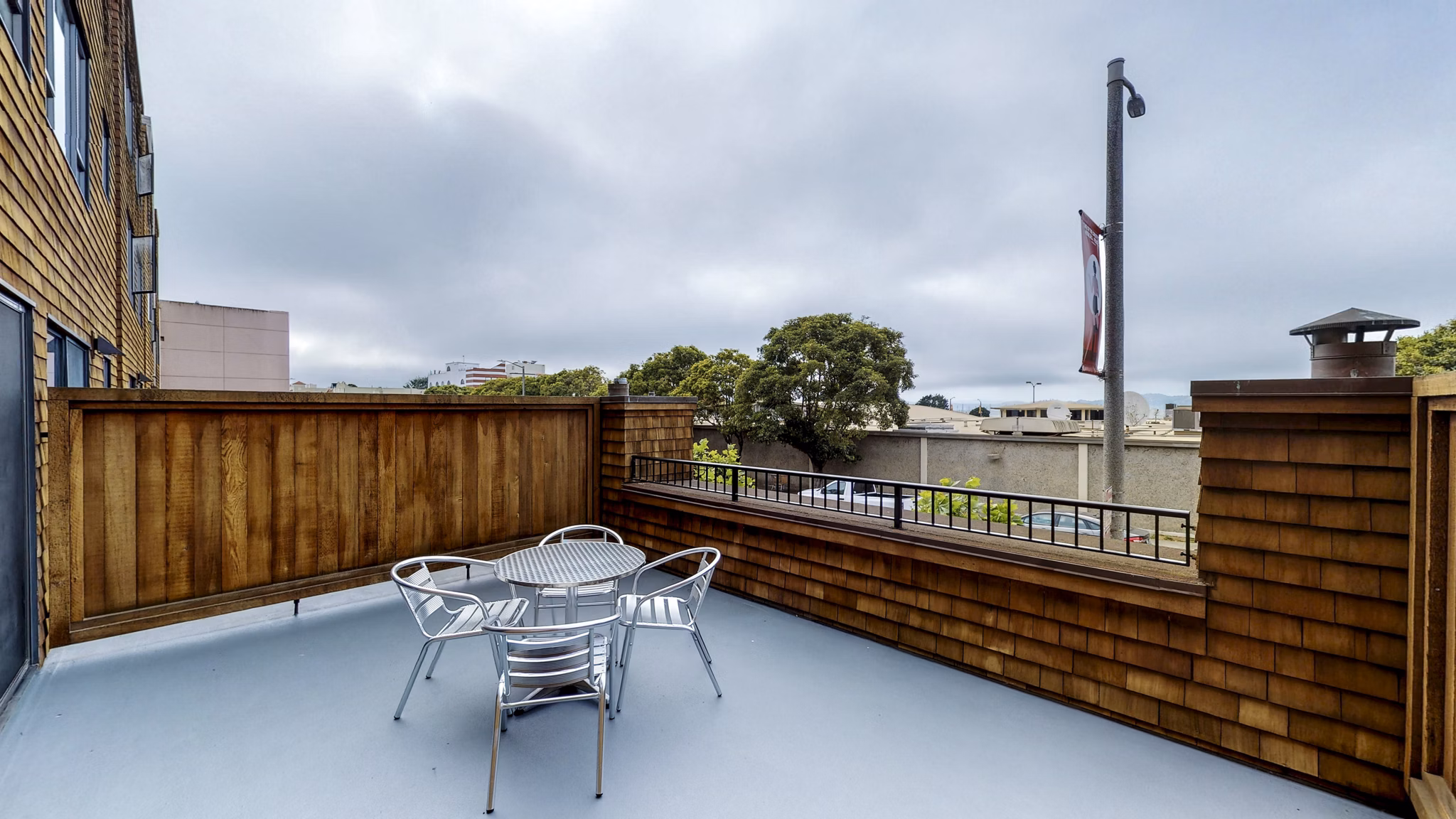 Patio with chic outdoor furniture at Marina Cove Apartments overlooking scenic views, luxury outdoor living