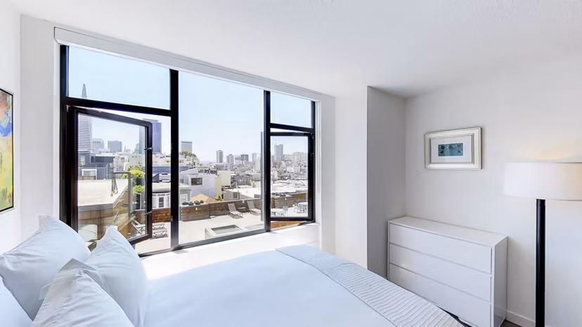 Contemporary bedroom with elegant decor at Telegraph Hill Apartments in San Francisco