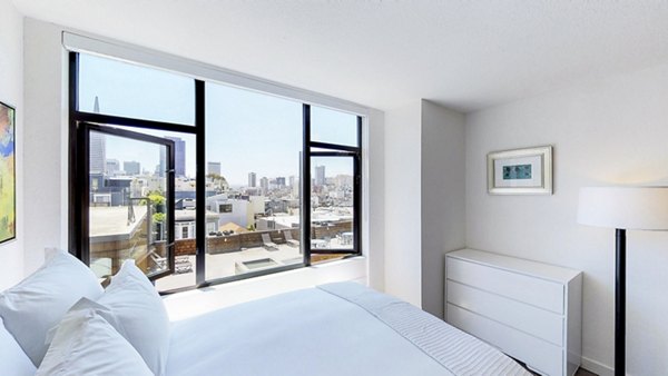 Contemporary bedroom with elegant decor at Telegraph Hill Apartments in San Francisco