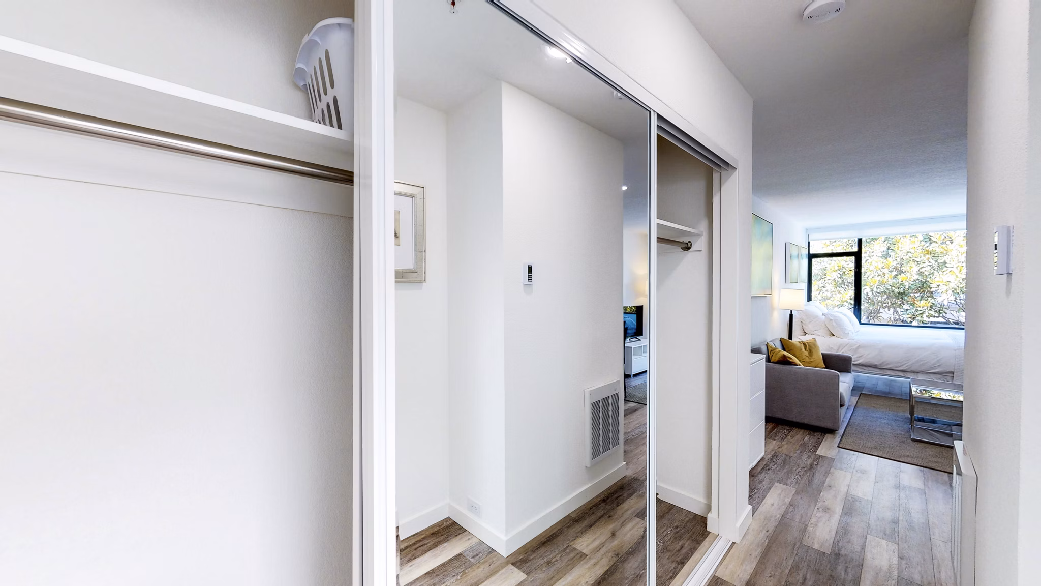 Bedroom closet with custom shelving at Telegraph Hill Apartments, offering luxury storage solutions in our modern San Francisco high-rise