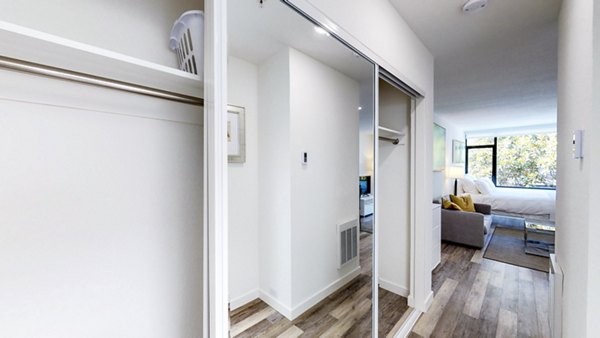 Bedroom closet with custom shelving at Telegraph Hill Apartments, offering luxury storage solutions in our modern San Francisco high-rise