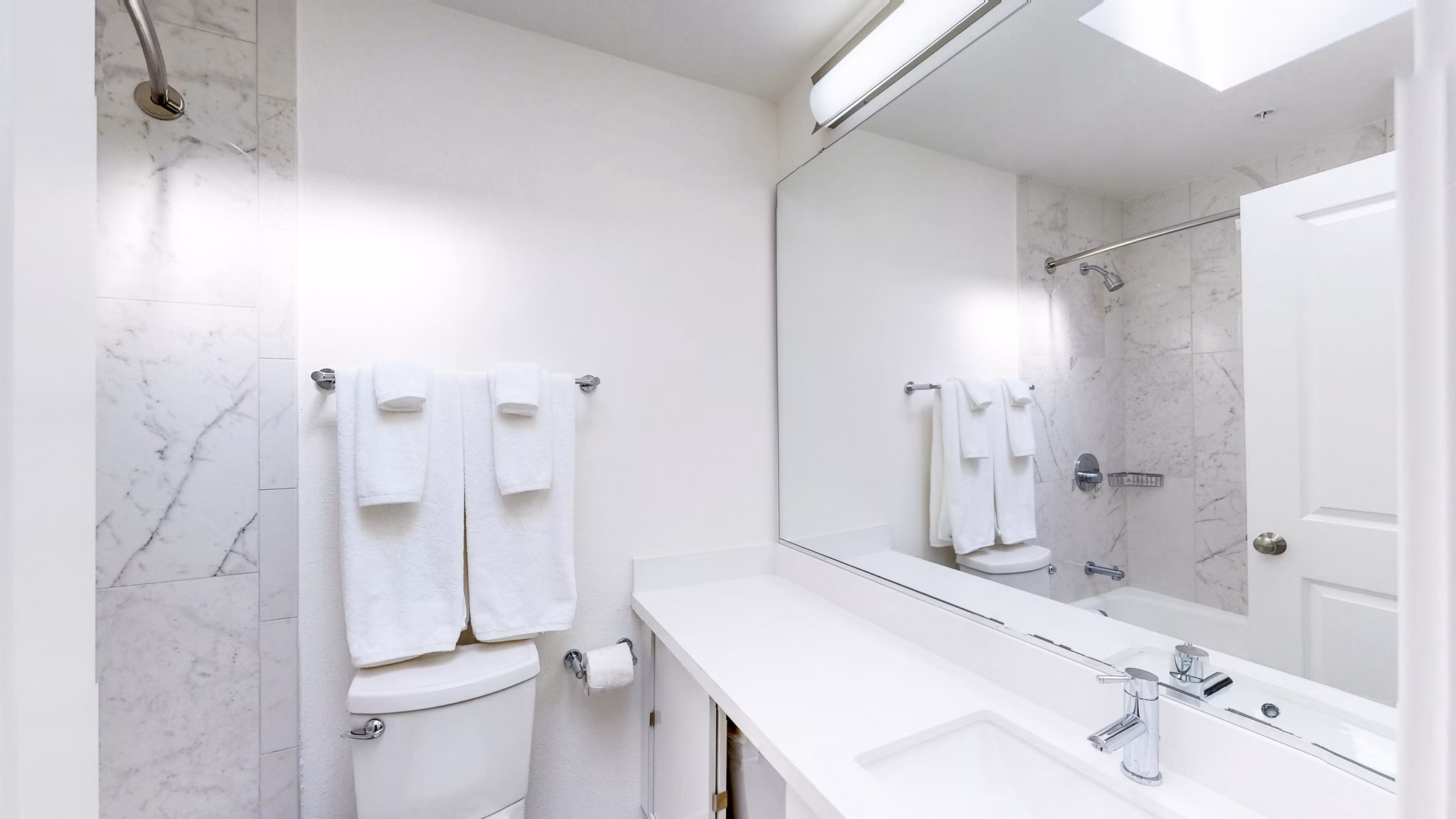 Bathroom featuring sleek fixtures and modern design at Telegraph Hill apartments