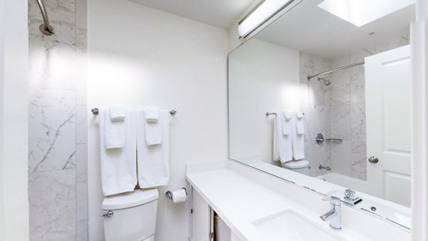 Bathroom featuring sleek fixtures and modern design at Telegraph Hill apartments