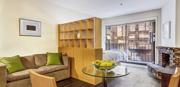 Dining room featuring elegant lighting and modern decor in Telegraph Hill Apartments