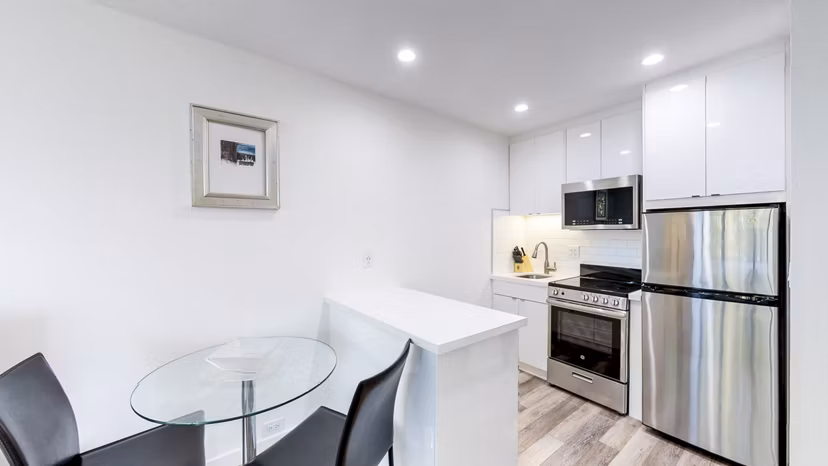 Dining room with modern furnishings at Telegraph Hill Apartments, luxury apartments by Greystar in a prime location