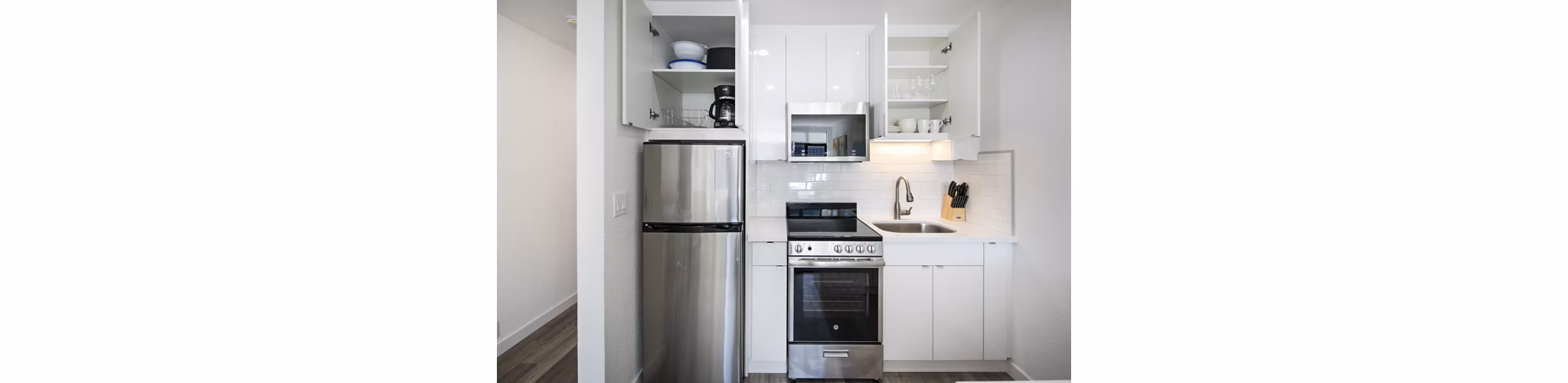Modern kitchen with stainless steel appliances at Telegraph Hill Apartments, offering luxury living in the heart of the city
