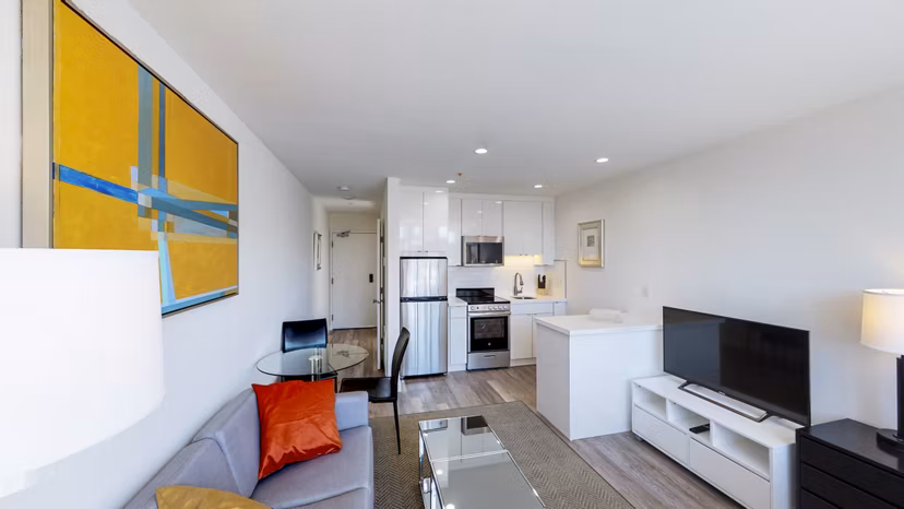 Spacious living room with modern furnishings at Telegraph Hill Apartments, luxury living by Greystar
