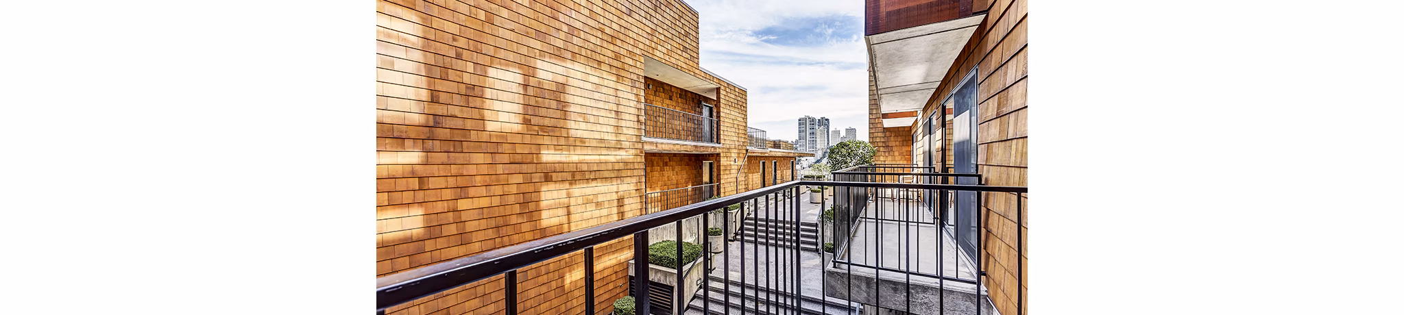 Private patio with scenic views at Telegraph Hill Apartments, ideal for relaxation and outdoor dining