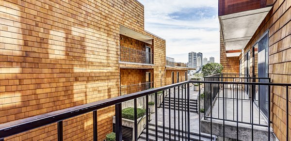 Private patio with scenic views at Telegraph Hill Apartments, ideal for relaxation and outdoor dining