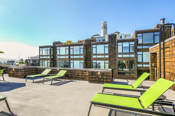 Patio with contemporary outdoor seating at Telegraph Hill Apartments