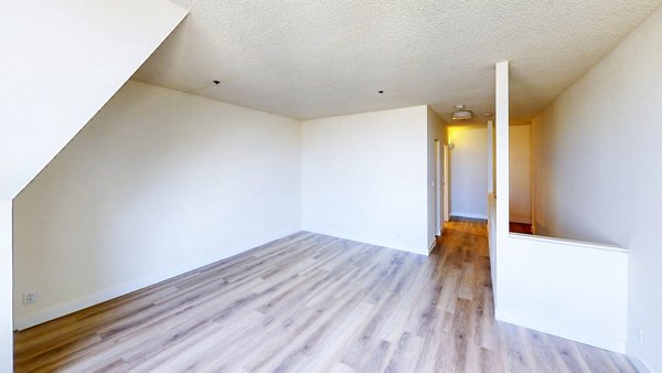 Modern bedroom with stylish decor at Trinity Towers Apartments offering luxury living in a vibrant urban setting