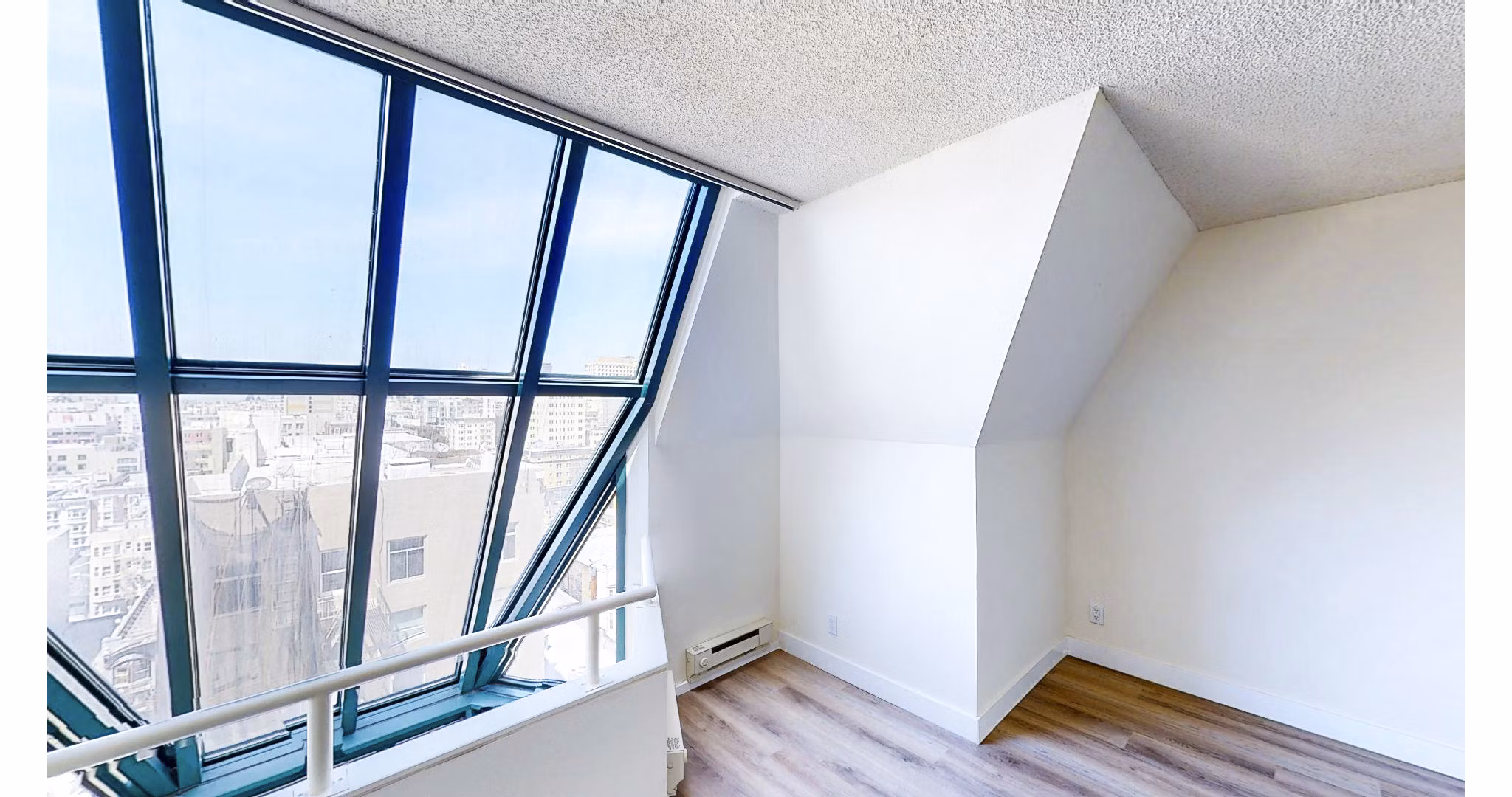 Luxurious bedroom with modern decor at Trinity Towers Apartments in San Francisco, featuring elegant design and ample natural light