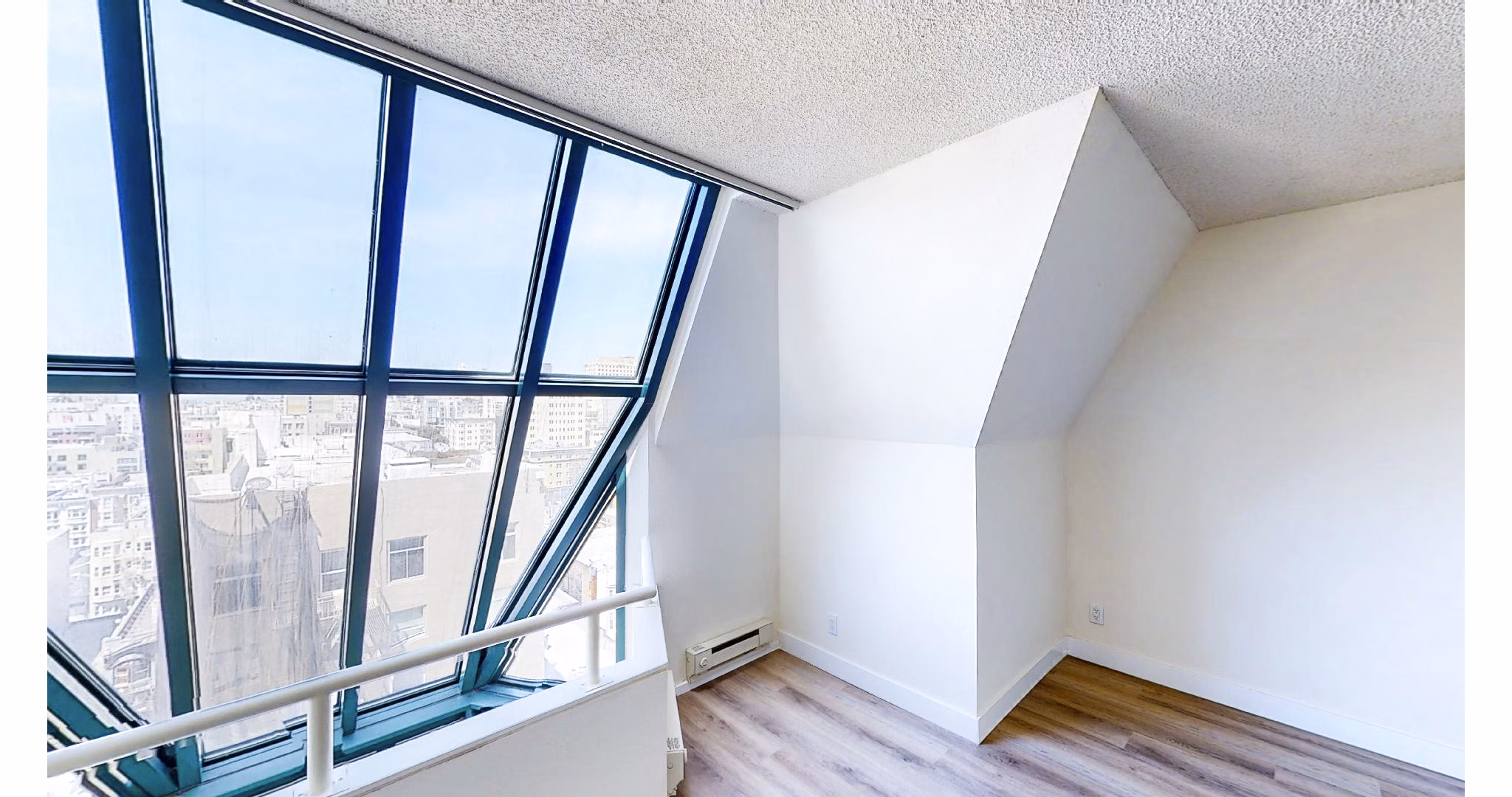 Luxurious bedroom with modern decor at Trinity Towers Apartments in San Francisco, featuring elegant design and ample natural light