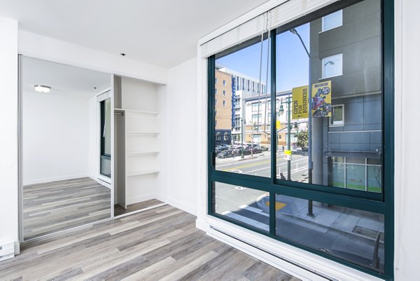 Cozy bedroom featuring stylish decor at Trinity Towers Apartments