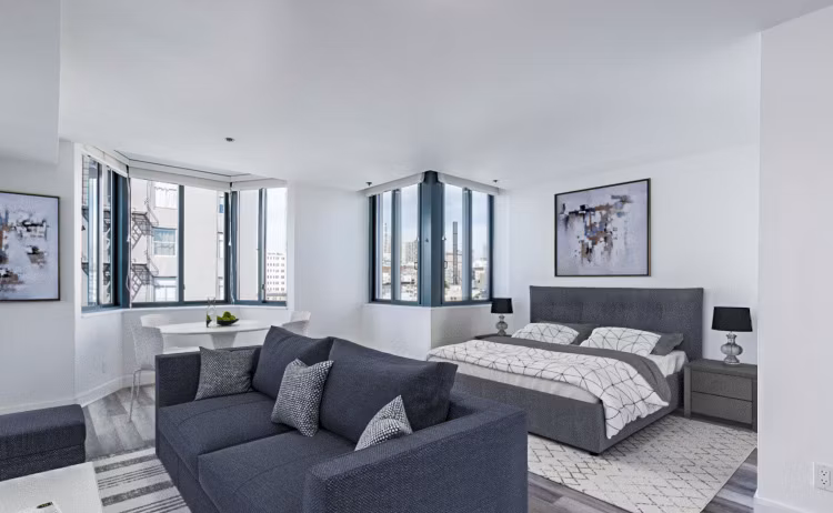 Studio bedroom with modern decor at Trinity Towers Apartments