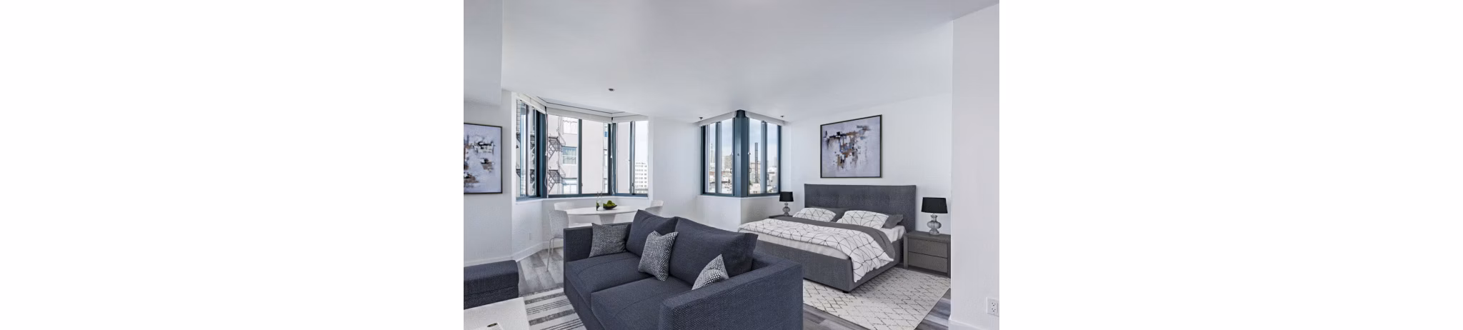 Studio bedroom with modern decor at Trinity Towers Apartments
