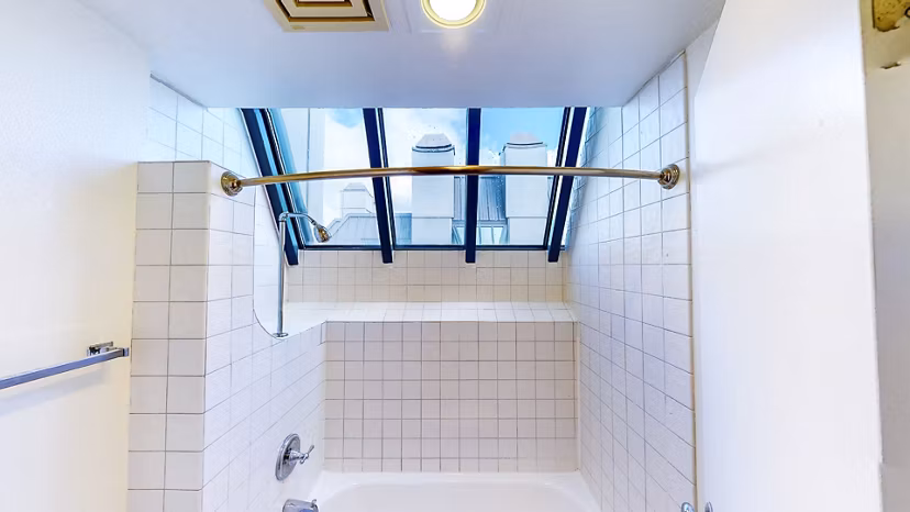 Modern bathroom with sleek fixtures at Trinity Towers Apartments, Greystar luxury community in a prime location