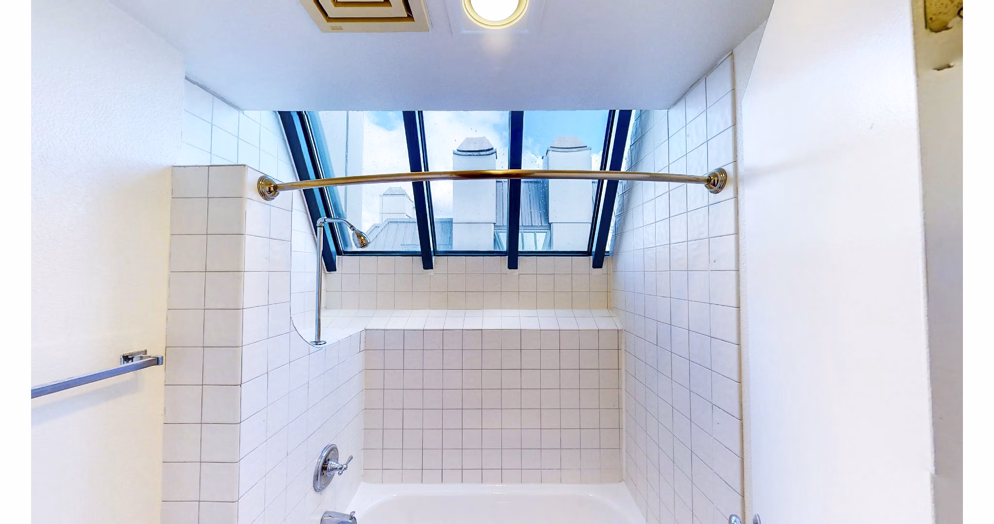 Modern bathroom with sleek fixtures at Trinity Towers Apartments, Greystar luxury community in a prime location