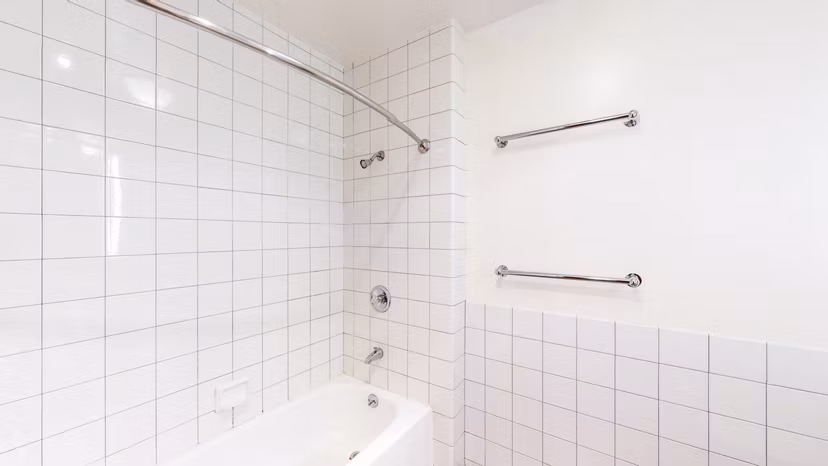 Bathroom with modern fixtures and sleek design at Trinity Towers Apartments