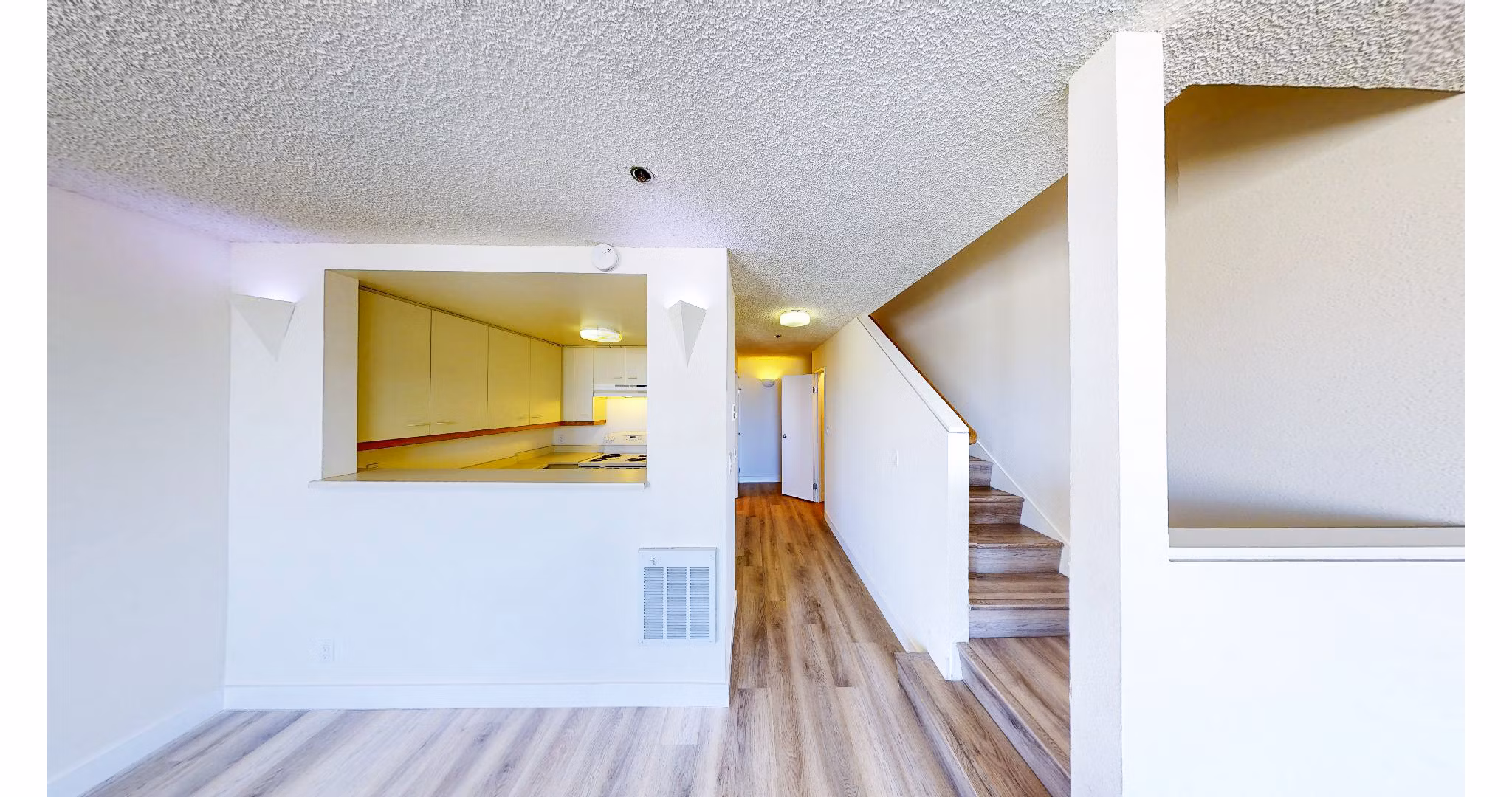 Dining room featuring elegant lighting and contemporary decor in Trinity Towers Apartments