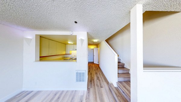 Dining room featuring elegant lighting and contemporary decor in Trinity Towers Apartments