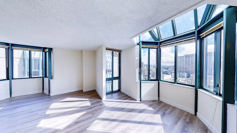 Living room with contemporary decor at Trinity Towers Apartments offering luxury lifestyle