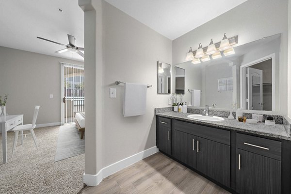Luxurious bathroom with sleek fixtures and modern design at The Met at 3rd and Fillmore Apartments