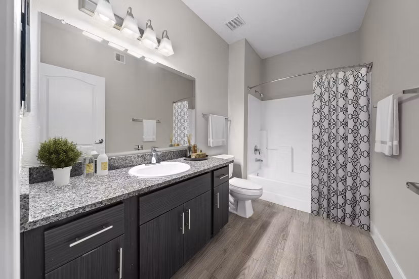 Luxury bathroom with modern fixtures at The Met at 3rd and Fillmore Apartments, a Greystar community