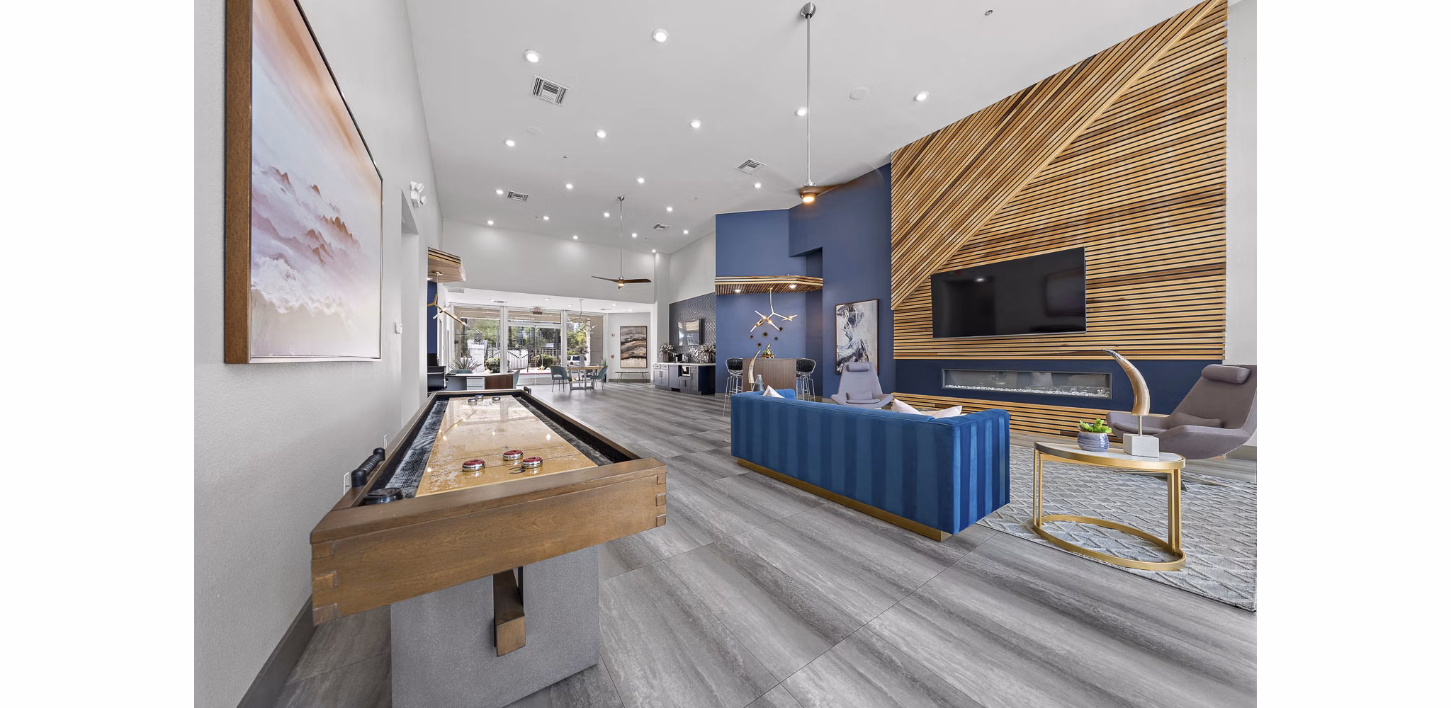 Clubhouse featuring modern decor and seating at The Met at 3rd and Fillmore Apartments in San Francisco