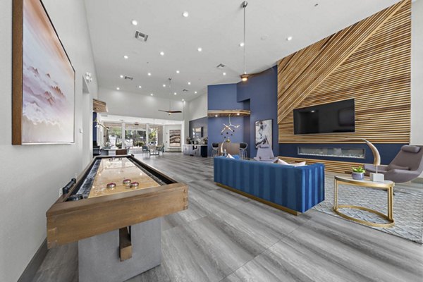 Clubhouse featuring modern decor and seating at The Met at 3rd and Fillmore Apartments in San Francisco