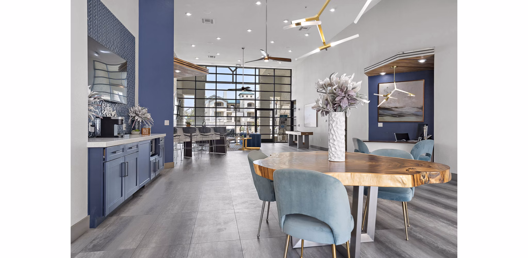 Clubhouse featuring modern design and communal spaces at The Met at 3rd and Fillmore Apartments in Phoenix
