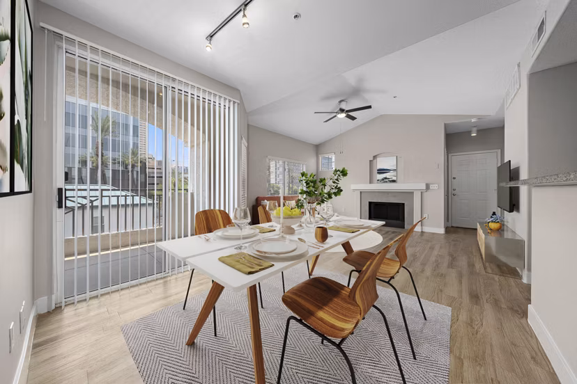 Elegant dining area with modern furnishings at The Met at 3rd and Fillmore Apartments in Phoenix Ideal space for luxury living and entertaining