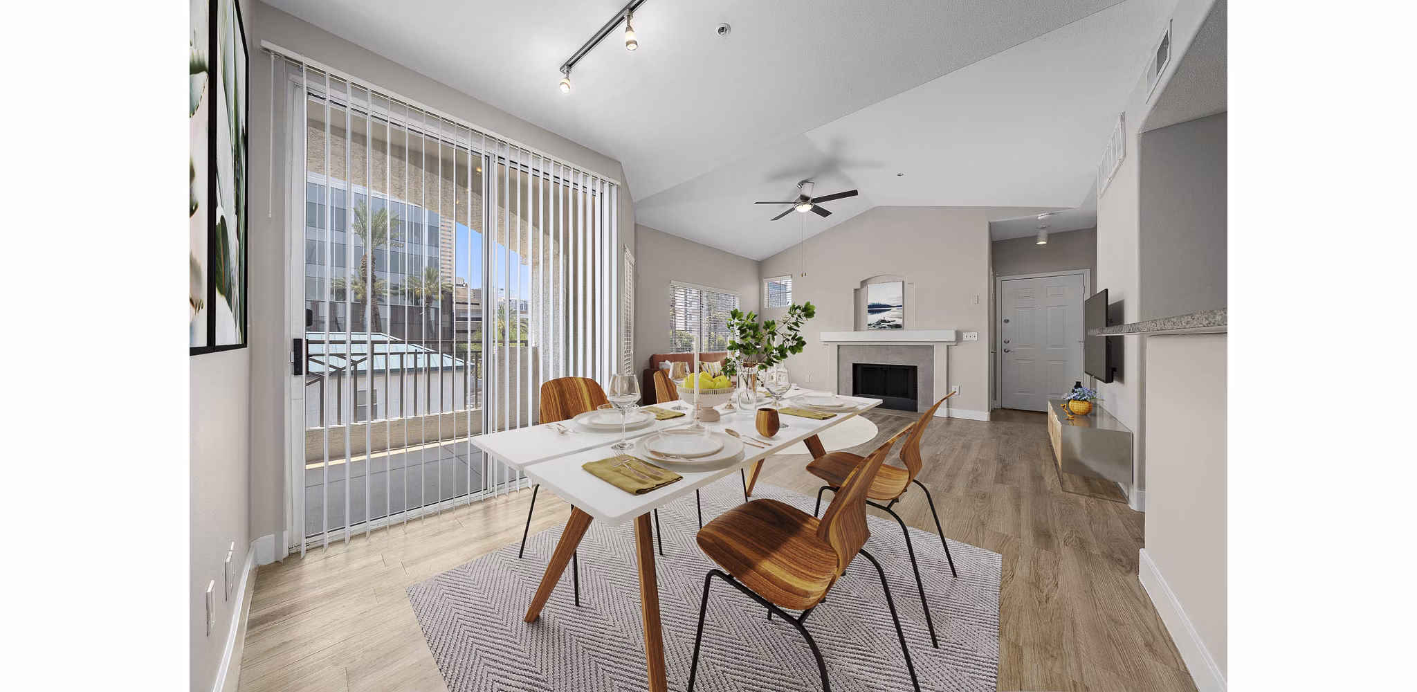 Elegant dining area with modern furnishings at The Met at 3rd and Fillmore Apartments in Phoenix Ideal space for luxury living and entertaining