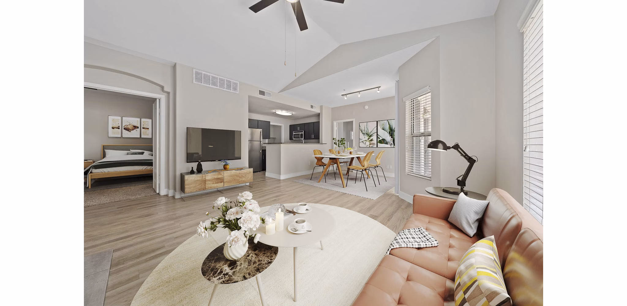 Modern living room with sleek design and natural light at The Met at 3rd and Fillmore Apartments in Phoenix, a Greystar luxury community