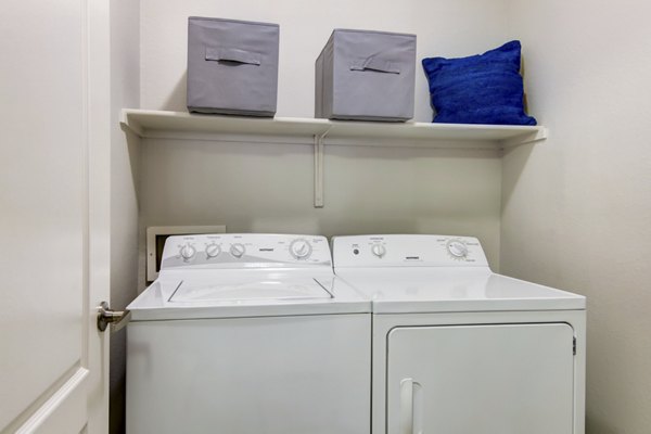 laundry room at The Met at 3rd and Fillmore Apartments 