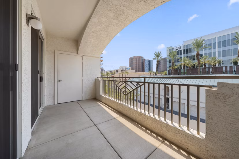 The Met at 3rd and Fillmore patio with modern seating and garden views, luxury apartments in urban setting