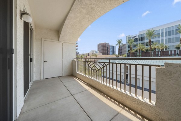The Met at 3rd and Fillmore patio with modern seating and garden views, luxury apartments in urban setting