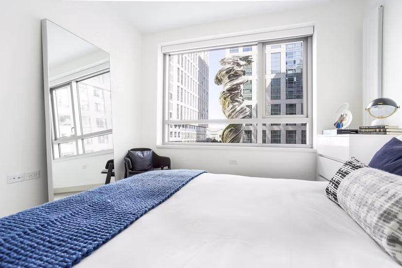 Bedroom featuring contemporary design elements at 33 8th St Apartments