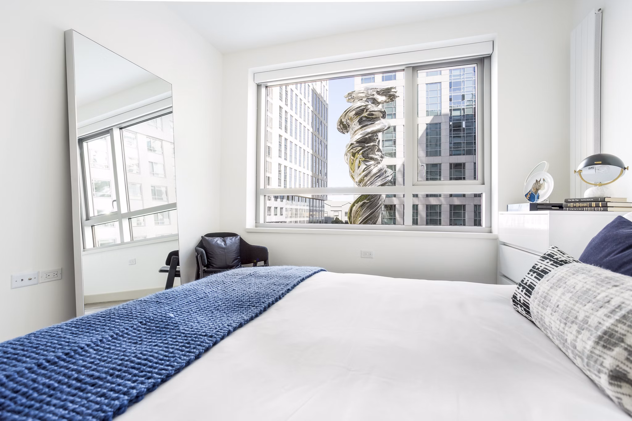 Bedroom featuring contemporary design elements at 33 8th St Apartments