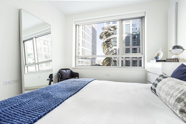 bedroom at 33 8th St Apartments