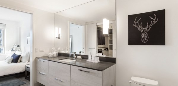 Modern bathroom with sleek fixtures at 33 8th St Apartments