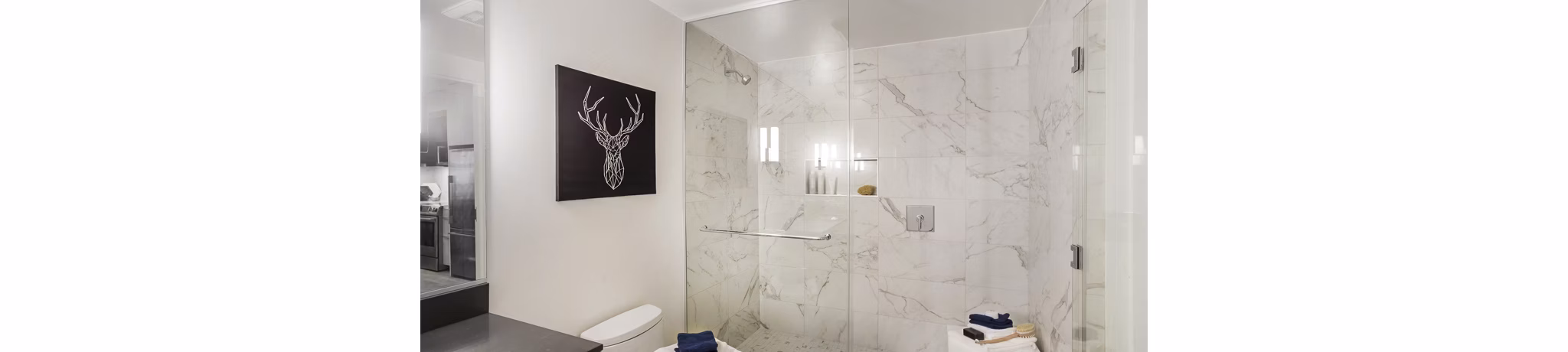 Bathroom featuring modern fixtures at 33 8th St Apartments, luxury living by Greystar in an upscale urban setting